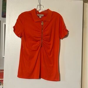 Michael Kors orange zip front polo collar shirt with gathered sleeves